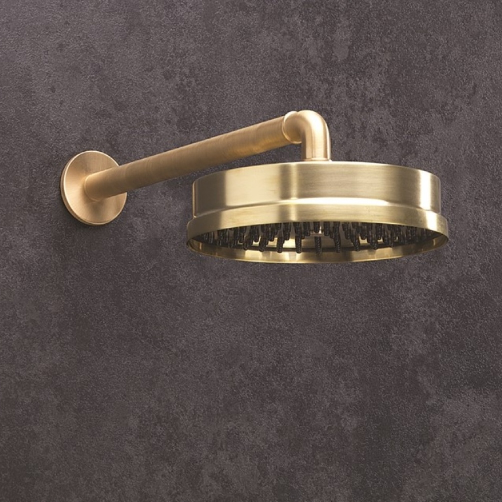 Product Lifestyle image of the Crosswater MPRO Industrial Unlacquered Brushed Brass 8" Easy Clean Shower Head